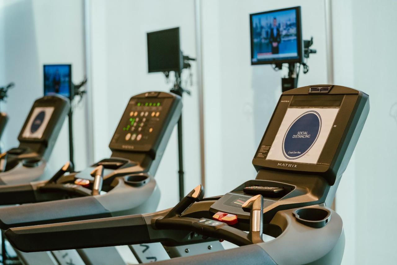 Grande Centre Point Sukhumvit 55 Thong Lo Hotel Bangkok Exterior photo A treadmill with a built-in television